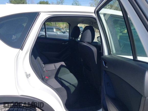 2015 Mazda CX-5 Sport with VIN JM3KE4BY3F0495511, listed as a IAAI auction lot 42170968 with 206,217 mi miles and . Bid and sale history available at carsss.com. Image 8.