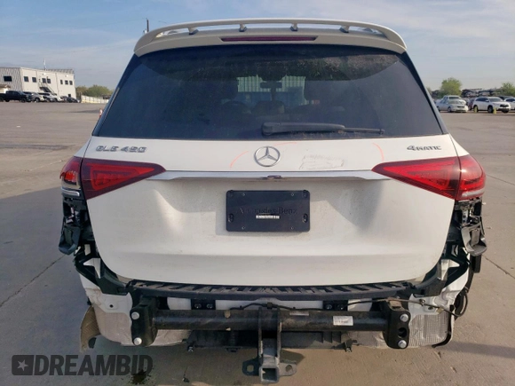 2023 Mercedes-Benz GLE 450 with VIN 4JGFB5KB5PA863344, listed as a Copart auction lot 49976145 with 57,077 mi miles and Salvage title. Bid and sale history available at DreamBid. Image 6.