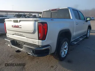 2021 GMC Sierra 1500 SLT z VIN 3GTU9DED7MG250461, wystawiony jako IAAI lot #41460881 z przebiegiem 89 344 mil mil oraz . Historia ofert i sprzedaży dostępna na DreamBid. Obrazek 4.