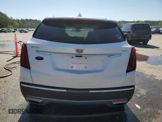 2021 Cadillac XT5 FWD Premium Luxury z VIN 1GYKNCRS2MZ209820, wystawiony jako Copart lot #51332565 z przebiegiem 52 916 mil mil oraz Szkoda całkowita • Salvage title. Historia ofert i sprzedaży dostępna na DreamBid. Obrazek 6.