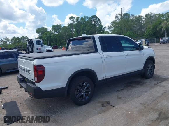 2024 Honda Ridgeline Sport with VIN 5FPYK3F14RB011166, listed as a IAAI auction lot 42591313 with 5,175 mi miles and . Bid and sale history available at DreamBid. Image 4.