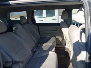 2021 Kia Sedona EX with VIN KNDMB5C19M6671229, listed as a IAAI auction lot 41066675 with 168,393 mi miles. Bid and sale history available at carsss.com. Image 8.