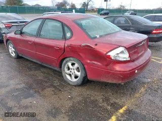 2001 Ford Taurus SES with VIN 1FAFP55U11A283914, listed as a IAAI auction lot 41110448 with 169,017 mi miles. Bid and sale history available at carsss.com. Image 3.