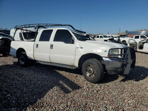 2001 Ford F-250 XL with VIN 1FTNW20L71ED89038, listed as a Copart auction lot 60929745 with 287,403 mi miles and Salvage title. Bid and sale history available at DreamBid. Image 4.