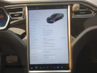 2013 Tesla Model S with VIN 5YJSA1CN3DFP06986, listed as a IAAI auction lot 41271801 with 150,307 mi miles and . Bid and sale history available at DreamBid. Image 18.