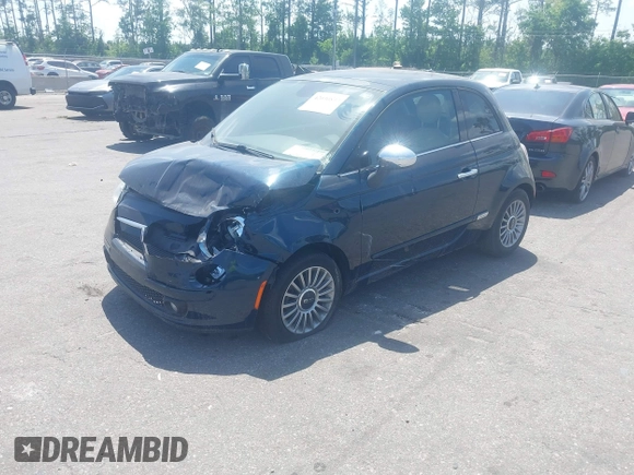 2013 FIAT 500 Lounge with VIN 3C3CFFCR6DT663496, listed as a IAAI auction lot 42030837 with 68,904 mi miles and . Bid and sale history available at DreamBid. Image 2.