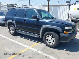 2001 Chevrolet Tahoe LT with VIN 1GNEK13T41R197657, listed as a IAAI auction lot 42164367 with 200,507 mi miles. Bid and sale history available at carsss.com. Image 1.