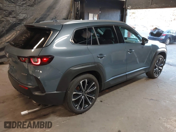 2023 Mazda CX-50 S Premium Plus with VIN 7MMVABEM3PN108555, listed as a IAAI auction lot 41202257 with 21,258 mi miles and . Bid and sale history available at DreamBid. Image 4.