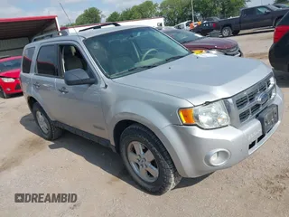 2008 Ford Escape XLT with VIN 1FMCU93188KD05798, listed as a IAAI auction lot 42497044 with 215,954 mi miles and . Bid and sale history available at DreamBid. Image 1.