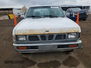 1997 Nissan Frontier XE with VIN 1N6SD16S8VC426940, listed as a Copart auction lot 55860235 with 242,265 mi miles and Salvage title. Bid and sale history available at DreamBid. Image 5.