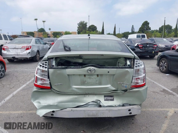 2007 Toyota Prius z VIN JTDKB20U477626959, wystawiony jako IAAI lot #42272184 z przebiegiem 179 443 mil mil oraz . Historia ofert i sprzedaży dostępna na DreamBid. Obrazek 6.