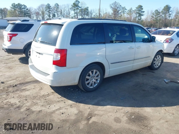 2012 Chrysler Town & Country Touring with VIN 2C4RC1BG9CR170138, listed as a IAAI auction lot 41902540 with 139,201 mi miles. Bid and sale history available at carsss.com. Image 4.