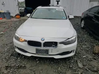 2014 BMW 3 Series 320i xDrive with VIN WBA3C3C51EF983592, listed as a Copart auction lot 60608765 with 195,061 mi miles and Salvage title. Bid and sale history available at DreamBid. Image 13.