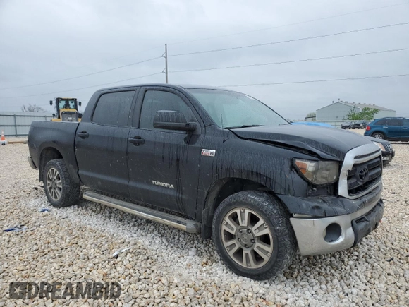 2010 Toyota Tundra with VIN 5TFDW5F10AX103893, listed as a Copart auction lot 50260265 with 191,937 mi miles and Clean title. Bid and sale history available at DreamBid. Image 4.