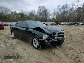 2013 Dodge Charger SE z VIN 2C3CDXBG3DH566891, wystawiony jako Copart lot #50501075 z przebiegiem 176 024 mil mil oraz Szkody całkowita. Historia ofert i sprzedaży dostępna na DreamBid. Obrazek 10.