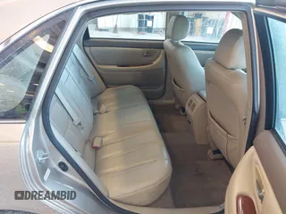 2002 Toyota Avalon XL with VIN 4T1BF28B32U255693, listed as a IAAI auction lot 41629186 with 221,335 mi miles and . Bid and sale history available at DreamBid. Image 8.
