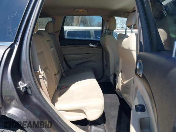2015 Jeep Grand Cherokee Altitude with VIN 1C4RJEAG0FC952260, listed as a IAAI auction lot 41738692 with 124,197 mi miles. Bid and sale history available at carsss.com. Image 8.