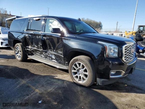 2019 GMC Yukon XL Denali with VIN 1GKS2HKJXKR368518, listed as a Copart auction lot 42833005 with 69,557 mi miles and Salvage Title. Bid and sale history available at carsss.com. Image 4.