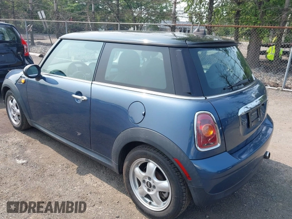2010 MINI Hardtop with VIN WMWMF3C57ATZ61622, listed as a IAAI auction lot 42467602 with 94,937 mi miles and . Bid and sale history available at DreamBid. Image 3.
