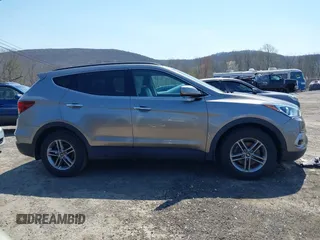 2017 Hyundai Santa Fe 2.4L z VIN 5NMZUDLB7HH015347, wystawiony jako IAAI lot #42035606 z przebiegiem 118 305 mil mil oraz . Historia ofert i sprzedaży dostępna na DreamBid. Obrazek 13.