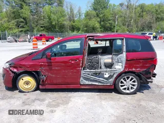 2012 Mazda 5 Grand Touring with VIN JM1CW2DL1C0123418, listed as a IAAI auction lot 42126956 with 112,411 mi miles and . Bid and sale history available at DreamBid. Image 14.