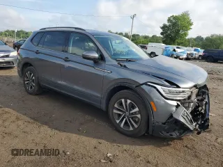 2022 Volkswagen Tiguan S with VIN 3VV0B7AX7NM173857, listed as a Copart auction lot 58382565 with 14,586 mi miles and Salvage title. Bid and sale history available at DreamBid. Image 4.