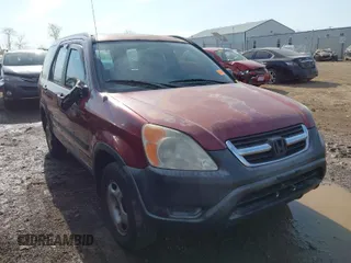 2002 Honda CR-V LX z VIN JHLRD78482C056705, wystawiony jako IAAI lot #42067936 z przebiegiem 278 644 mil mil oraz . Historia ofert i sprzedaży dostępna na DreamBid. Obrazek 1.