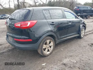 2012 Kia Sportage LX with VIN KNDPB3A23C7203826, listed as a IAAI auction lot 41464022 with 260,980 mi miles. Bid and sale history available at carsss.com. Image 4.