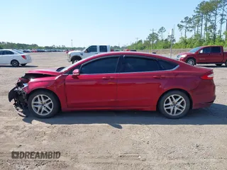 2015 Ford Fusion SE with VIN 1FA6P0H73F5123218, listed as a IAAI auction lot 42010665 with 185,309 mi miles. Bid and sale history available at carsss.com. Image 14.