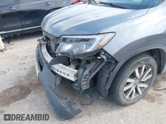 2020 Honda Pilot EX-L z VIN 5FNYF5H55LB028509, wystawiony jako IAAI lot #41945843 z przebiegiem Nie podano mil oraz . Historia ofert i sprzedaży dostępna na DreamBid. Obrazek 6.