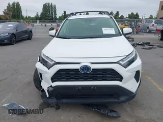 2023 Toyota RAV4 Hybrid LE with VIN JTMMWRFV3PD193495, listed as a IAAI auction lot 42475531 with 51,982 mi miles and . Bid and sale history available at DreamBid. Image 12.