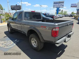 2005 Ford Ranger XLT z VIN 1FTZR45E05PA33894, wystawiony jako Copart lot #60548815 z przebiegiem 154 796 mil mil oraz Czysty tytuł • Clean title. Historia ofert i sprzedaży dostępna na DreamBid. Obrazek 3.