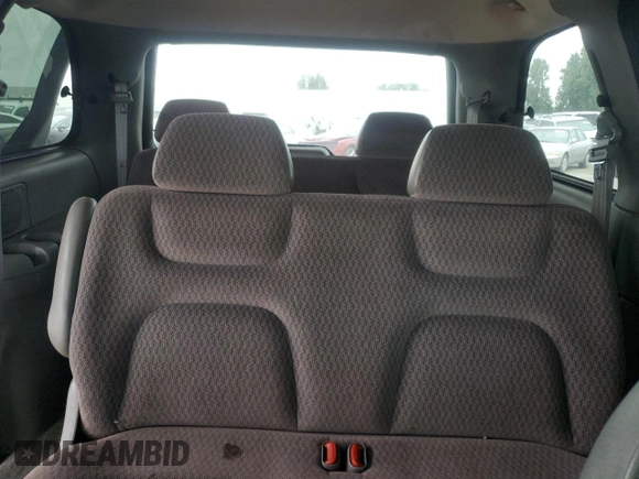 1999 Dodge Caravan with VIN 2B4GP25R8XR200747, listed as a Copart auction lot 58273225 with 182,147 mi miles and Salvage title. Bid and sale history available at DreamBid. Image 10.