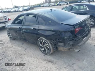 2023 Volkswagen Jetta GLI Autobahn z VIN 3VW2T7BU2PM054137, wystawiony jako IAAI lot #42029063 z przebiegiem 17 456 mil mil oraz . Historia ofert i sprzedaży dostępna na DreamBid. Obrazek 3.