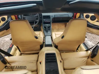 1986 Porsche 928 z VIN WP0JB0924GS860470, wystawiony jako Copart lot #79404034 z przebiegiem 77 247 mil mil oraz Tytuł czysty. Historia ofert i sprzedaży dostępna na DreamBid. Obrazek 8.