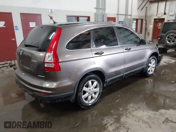 2011 Honda CR-V SE z VIN 5J6RE4H41BL010832, wystawiony jako IAAI lot #41869539 z przebiegiem 156 968 mil mil oraz . Historia ofert i sprzedaży dostępna na DreamBid. Obrazek 4.