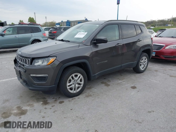 2018 Jeep Compass Sport с VIN 3C4NJCAB9JT489149, выставлен на аукционе IAAI как лот 42025904 с пробегом 87 099 миль миль и . История ставок и продаж доступна на DreamBid. Изображение 17.