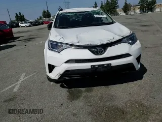 2017 Toyota RAV4 LE with VIN JTMZFREV1HJ104274, listed as a Copart auction lot 55679985 with 105,660 mi miles and Salvage Title. Bid and sale history available at DreamBid. Image 15.
