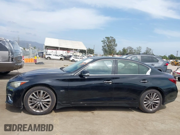 2019 Infiniti Q50 Luxe with VIN JN1EV7AP9KM543079, listed as a IAAI auction lot 42244113 with 36,291 mi miles and . Bid and sale history available at DreamBid. Image 14.