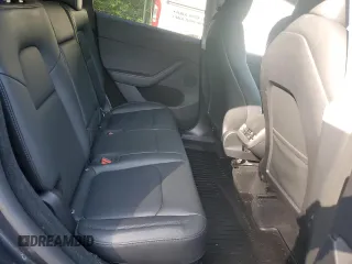 2024 Tesla Model Y Long Range with VIN 7SAYGDEE4RA299503, listed as a Copart auction lot 61950585 with 17,077 mi miles and Salvage title. Bid and sale history available at DreamBid. Image 10.