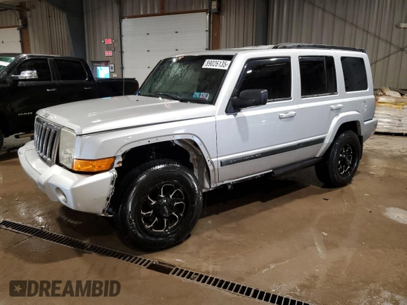 2009 Jeep Commander Sport z VIN 1J8HG48K09C526337, wystawiony jako Copart lot #89026135 z przebiegiem 194 514 mil mil oraz Szkoda całkowita • Salvage title. Historia ofert i sprzedaży dostępna na DreamBid. Obrazek 1.