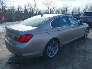 2012 BMW 7 Series 740i with VIN WBAKA4C58CDS99381, listed as a IAAI auction lot 41655715 with 112,731 mi miles and . Bid and sale history available at DreamBid. Image 4.