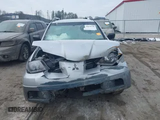 2003 Mitsubishi Outlander LS with VIN JA4LZ31G93U105062, listed as a IAAI auction lot 40978708 with 202,965 mi miles. Bid and sale history available at carsss.com. Image 6.