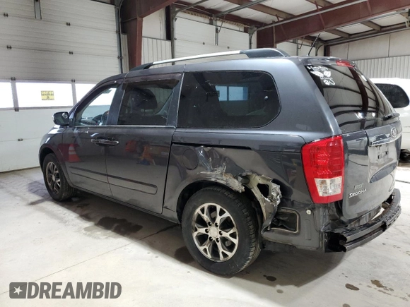 2014 Kia Sedona LX with VIN KNDMG4C77E6541368, listed as a Copart auction lot 52749305 with 130,253 mi miles and Salvage Title. Bid and sale history available at carsss.com. Image 2.
