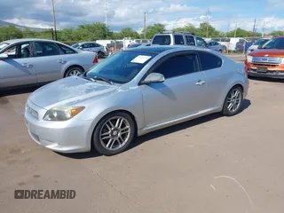 2006 Scion tC with VIN JTKDE177X60088987, listed as a IAAI auction lot 41893922 with 153,282 mi miles. Bid and sale history available at carsss.com. Image 2.