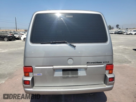 1999 Volkswagen EuroVan GLS с VIN WV2KH2705XH017697, выставлен на аукционе Copart как лот 69303664 с пробегом 156 811 миль миль и Списание • Salvage title. История ставок и продаж доступна на DreamBid. Изображение 6.