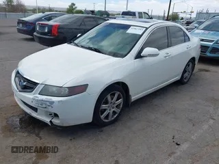 2005 Acura TSX with VIN JH4CL96825C002634, listed as a IAAI auction lot 42067243 with 262,009 mi miles and . Bid and sale history available at carsss.com. Image 2.