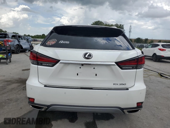 2021 Lexus RX 350 with VIN 2T2JZMDA5MC299559, listed as a Copart auction lot 60450495 with 24,390 mi miles and Salvage title. Bid and sale history available at DreamBid. Image 6.