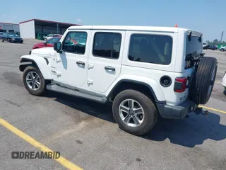 2018 Jeep Wrangler Unlimited Sahara with VIN 1C4HJXEG6JW112976, listed as a IAAI auction lot 42559123 with 76,066 mi miles and . Bid and sale history available at DreamBid. Image 3.