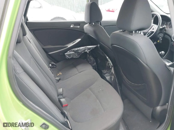 2013 Hyundai Accent SE with VIN KMHCU5AEXDU069586, listed as a IAAI auction lot 40968974 with 98,939 mi miles. Bid and sale history available at carsss.com. Image 8.